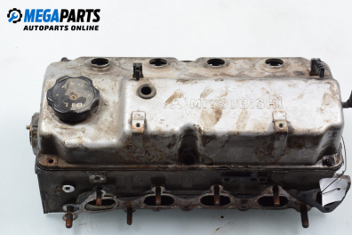 Глава за Mitsubishi Space Star Minivan (06.1998 - 12.2004) 1.3 16V (DG1A), 86 к.с.