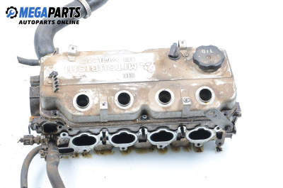 Глава за Mitsubishi Carisma Hatchback (07.1995 - 06.2006) 1.6 (DA1A), 90 к.с.